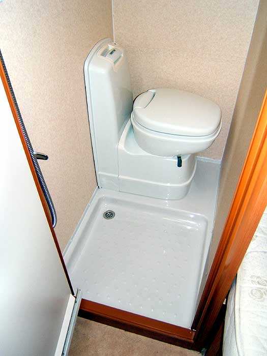 The cassette toilet and shower cubicle.